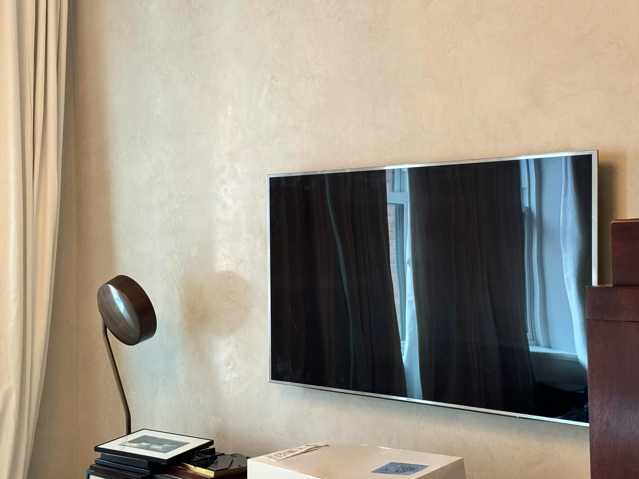 Laight St Residence — detail of the bedroom media wall in lime plaster