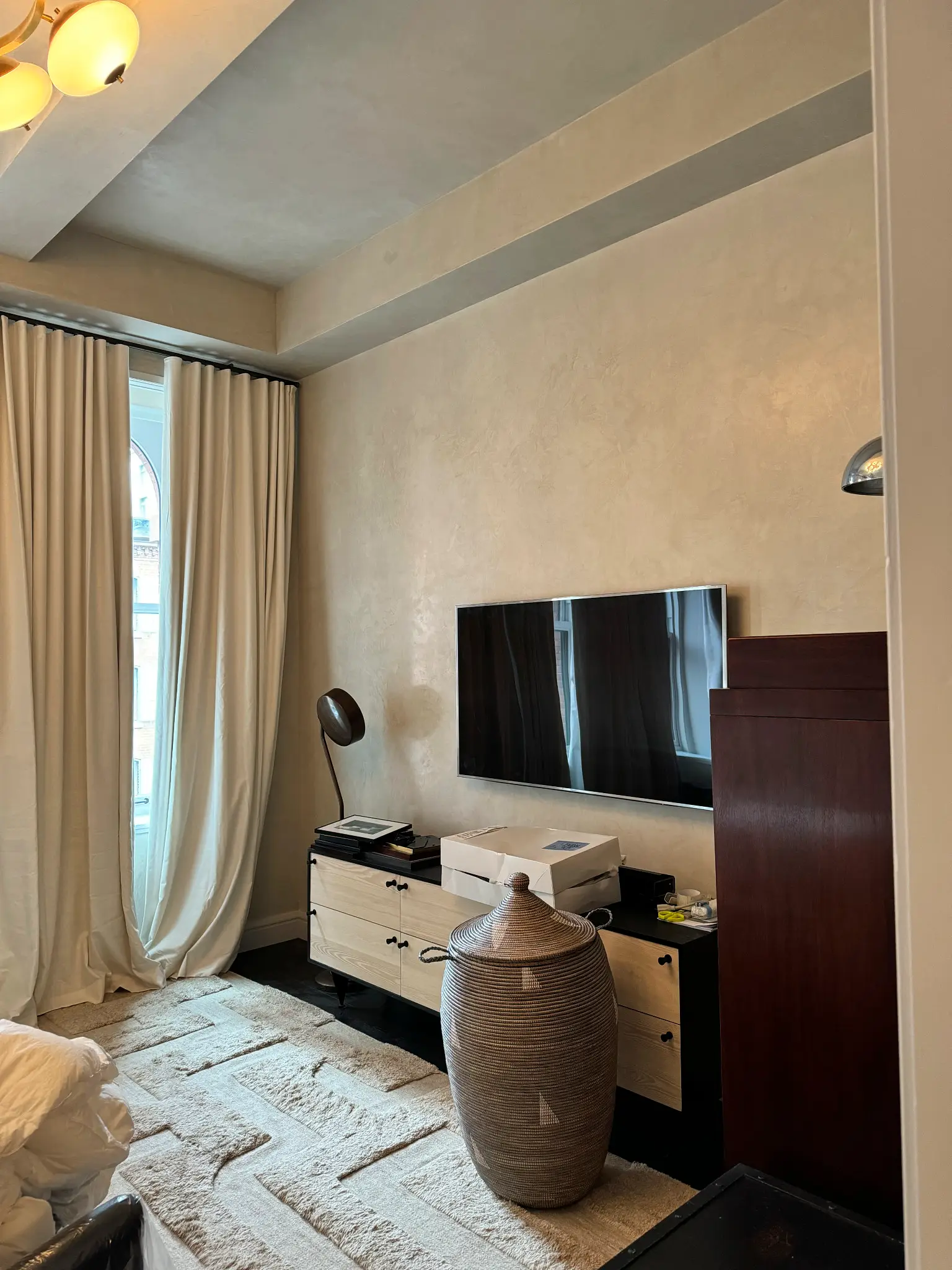 Laight St Residence — bedroom media wall in lime plaster