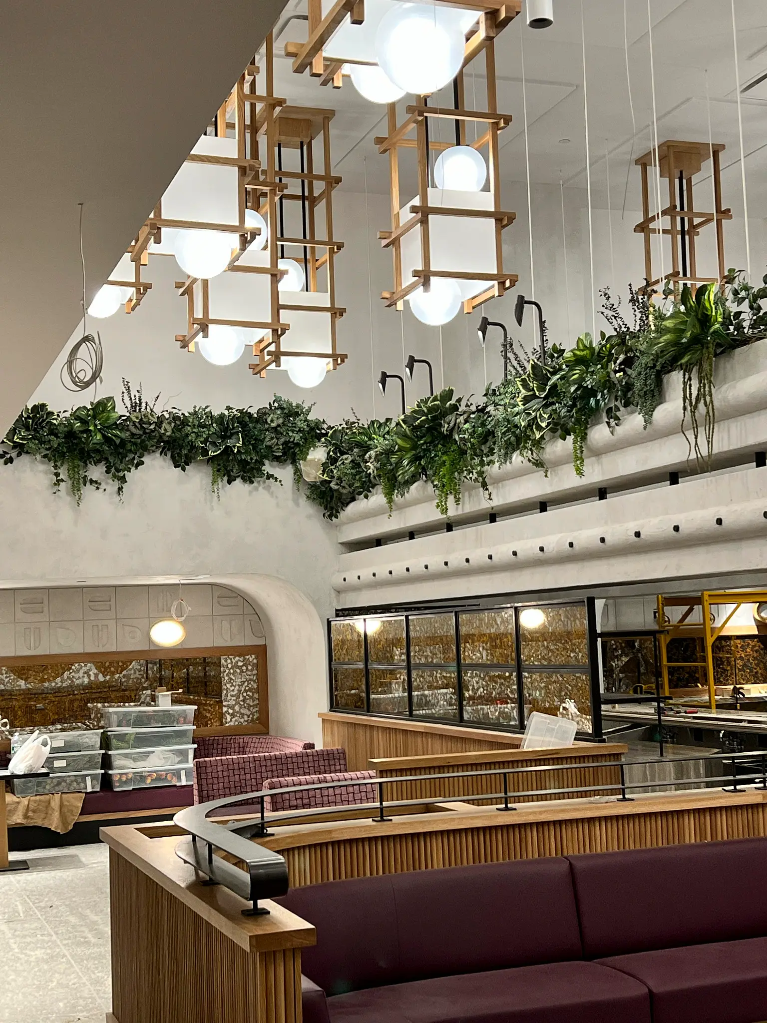 Moxy Hotel Williamsburg — wide view of the curved plaster soffit above the dining room
